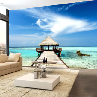 ARTGEIST - Fototapet med udsigt til hytte på vandet i paradis - Flere størrelser 100x70